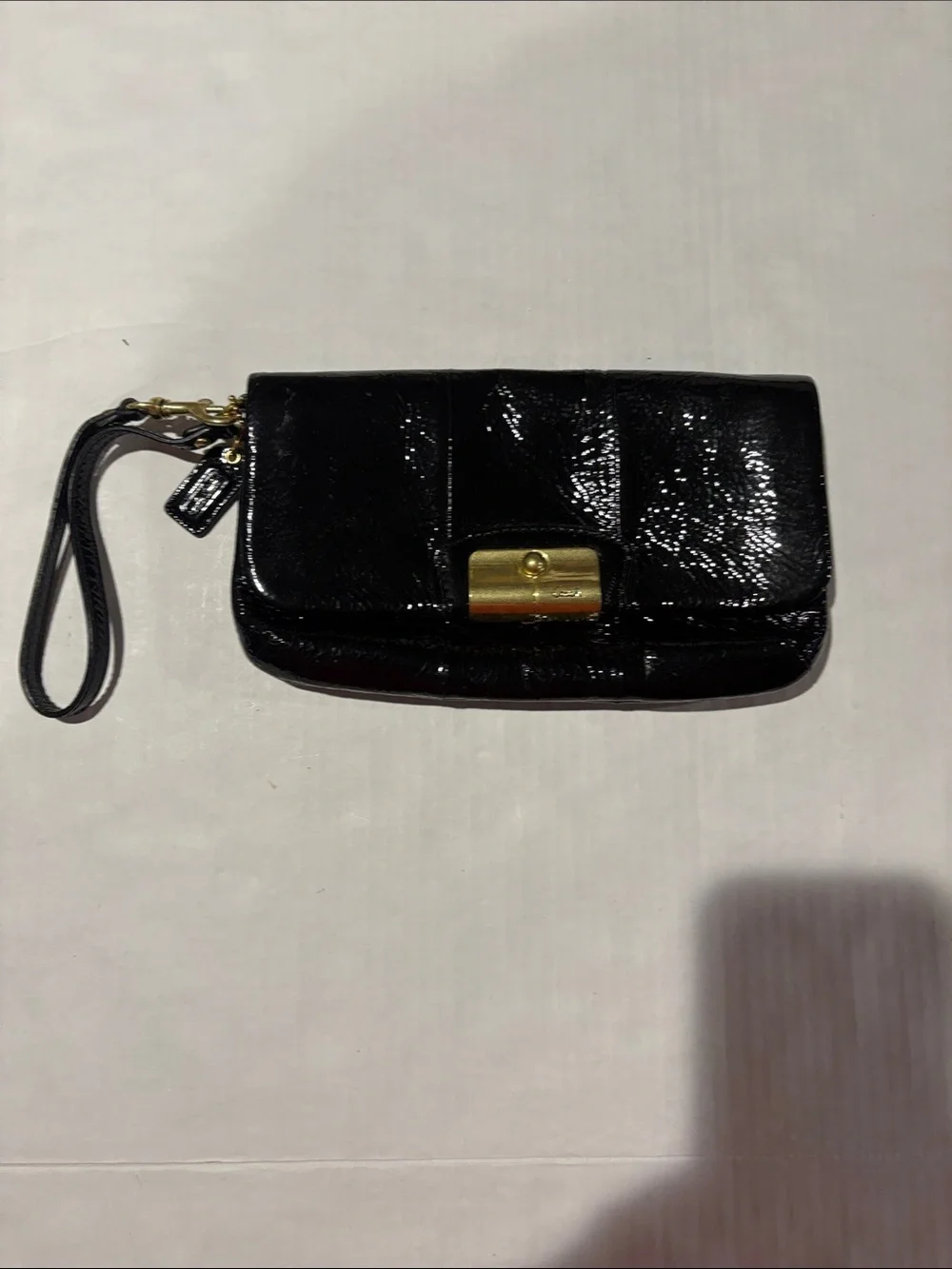 Coach Kristen Black Patent Leather Wristlet Phone Pouch with Gold Hardware